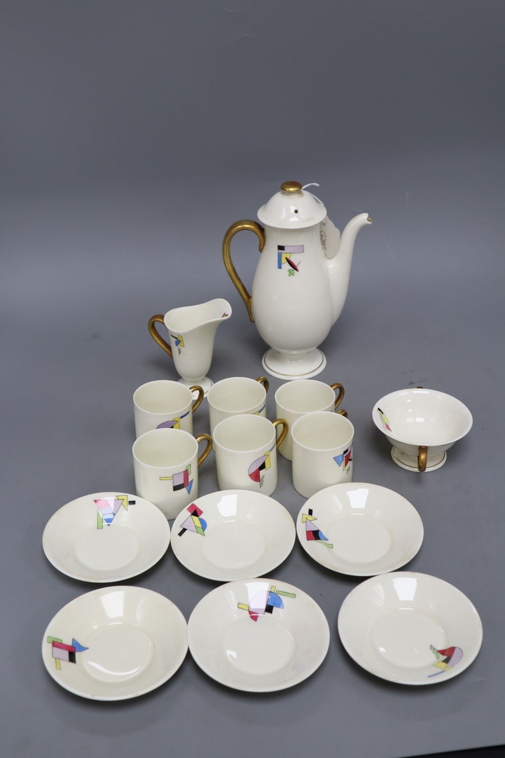 A Royal Doulton Art Deco porcelain coffee set, with geometric pattern, coffee pot 20.5cm